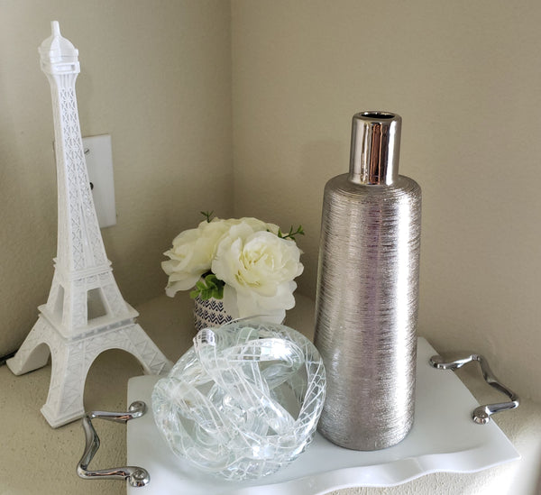 Silver bottle shaped vase