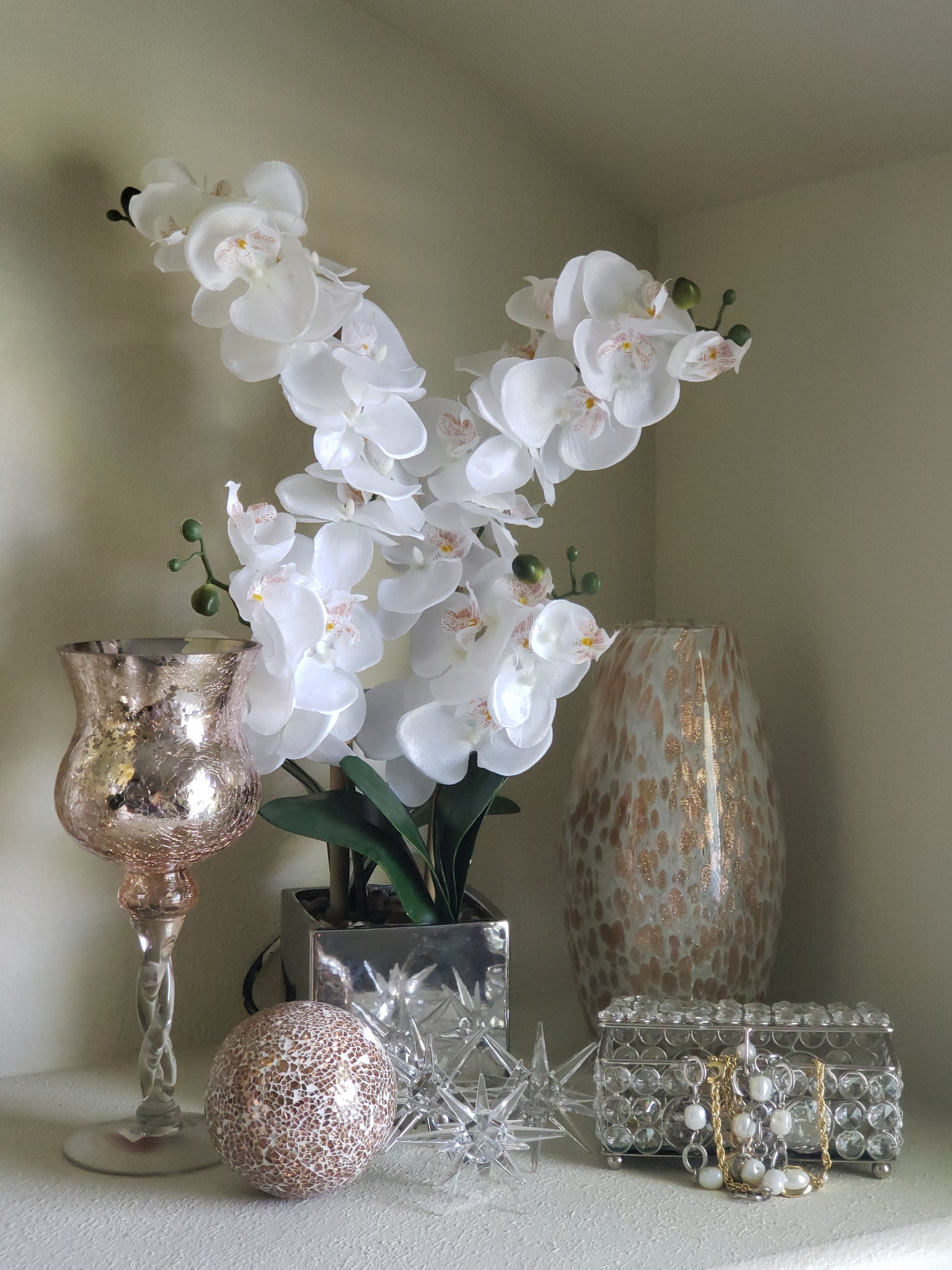 white with rose gold patterned glass vase