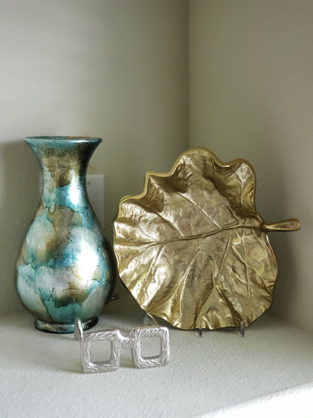 Teal and gold patterned vase