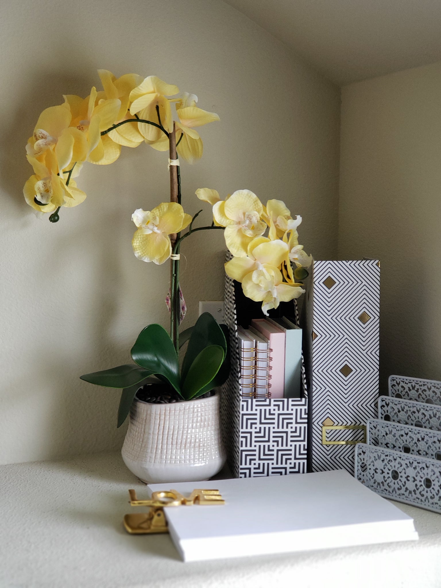 black, white and gold file folder storage