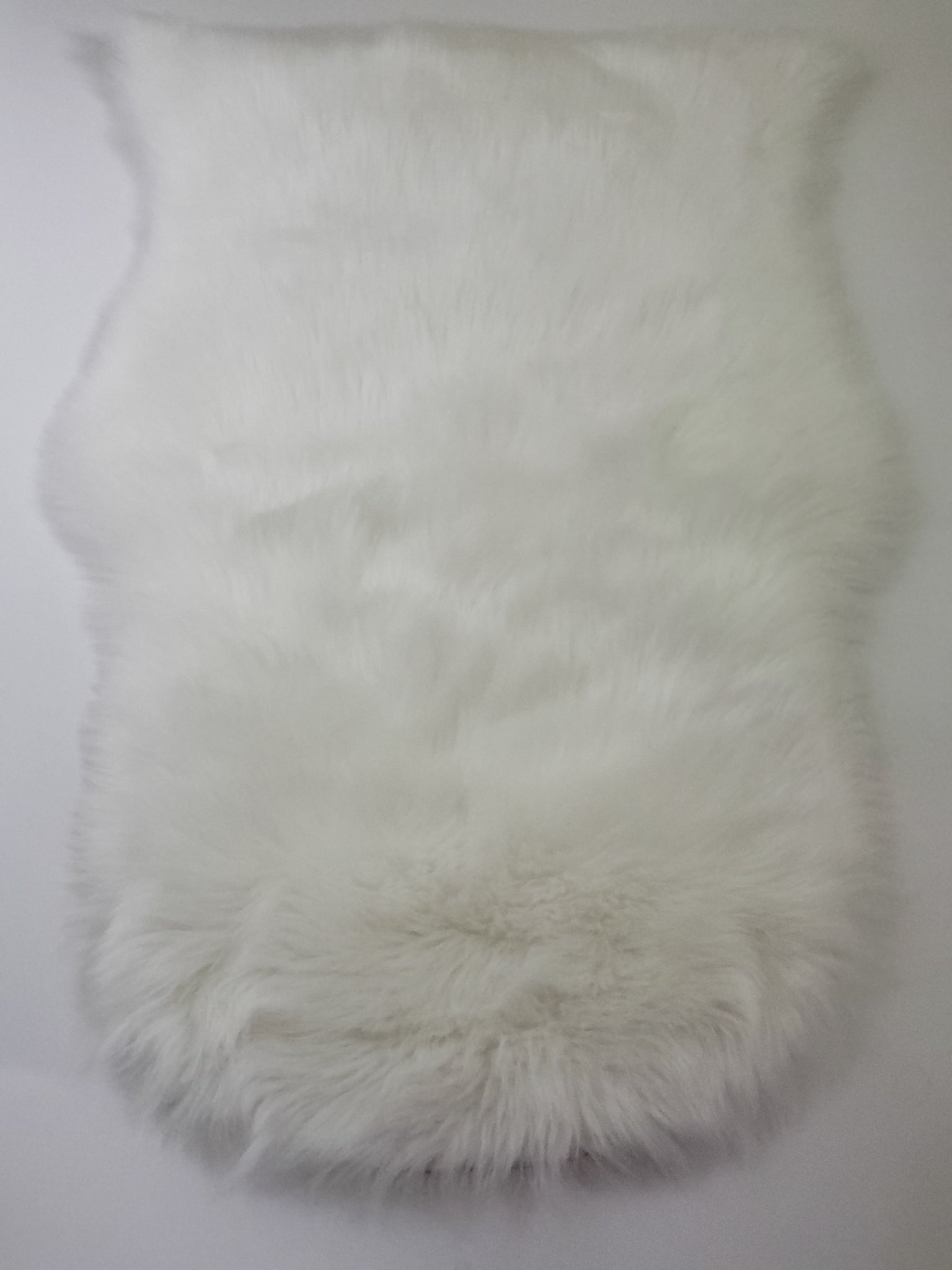 White Faux fur lambskin rug 25 x 40 inches