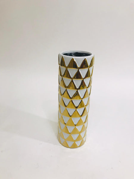 White and gold patterened cylindrical vase