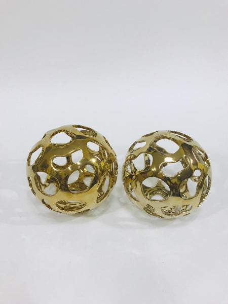 perforated gold sphere