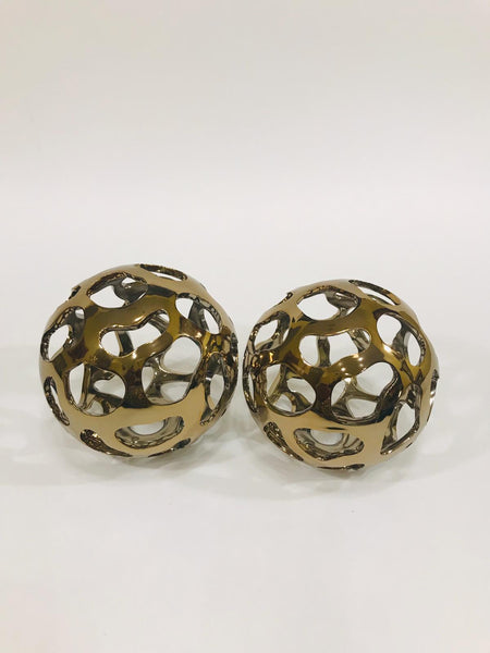 perforated bronze sphere