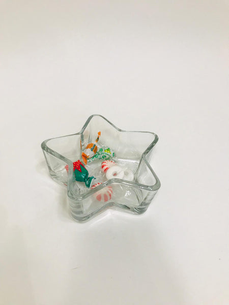 Star shaped transparent glass bowl