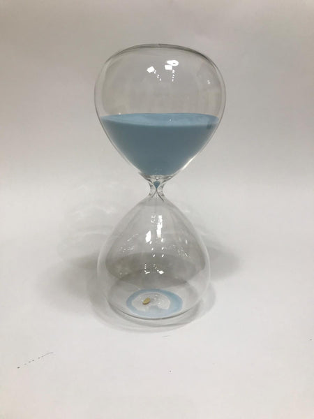 large blue sand hour glass measures 11 x 5 inches