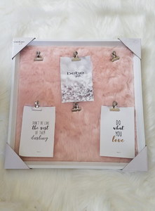 Notice board pink fluffy background with silver clips