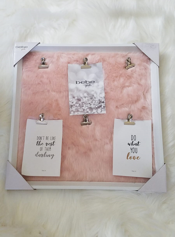 Notice board pink fluffy background with silver clips