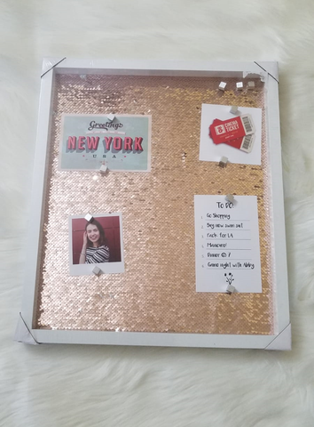 notice board with pink sequins background and silver magnets